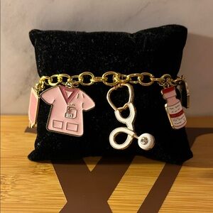 Gold and Pink Charm Bracelet